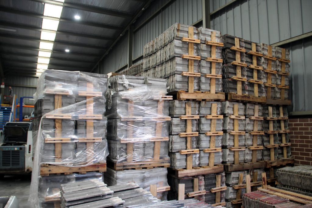 Concrete Roof Tiles Melbourne 3 Pallets of concrete roof tiles in the Royce Roofing warehouse